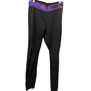 Nike Pro Women’s Dri-FIT Leggings Black Purple Iridescent Waistband Size M - $45